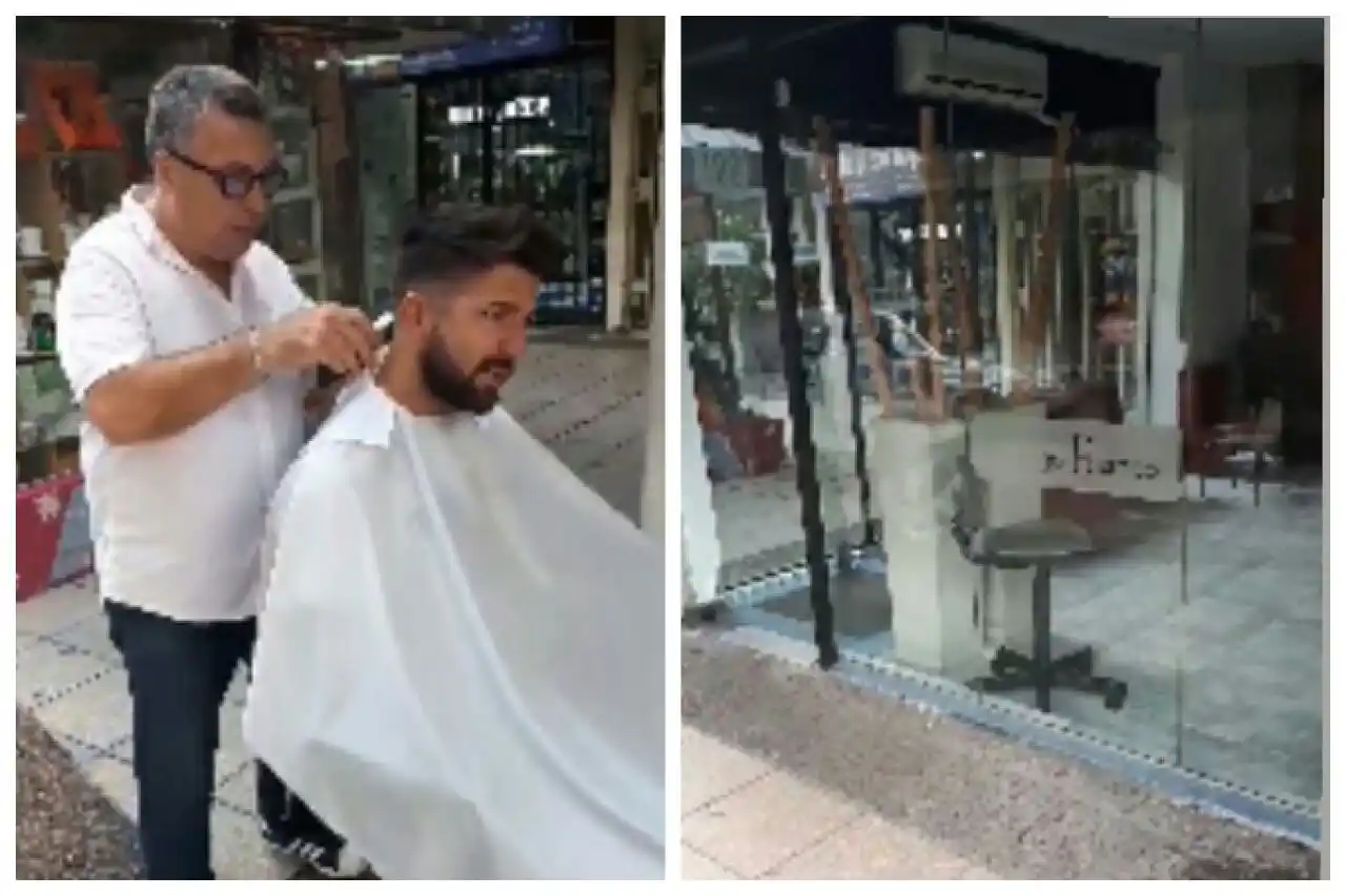 Un peluquero de Ramos Mejía atiende en la vereda porque no puede pagar la luz