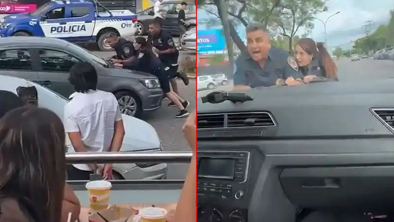 Dramático video: Para evadir un control, arrastró a dos policías en el capot de su auto