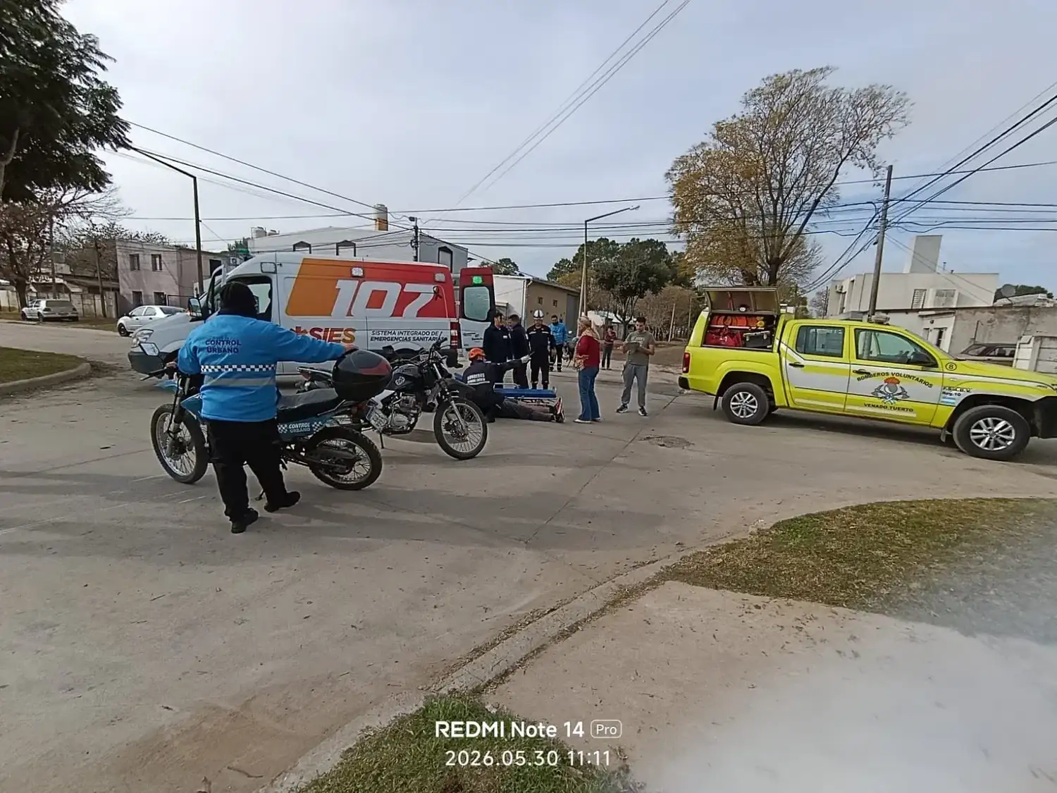 Motociclista caído.