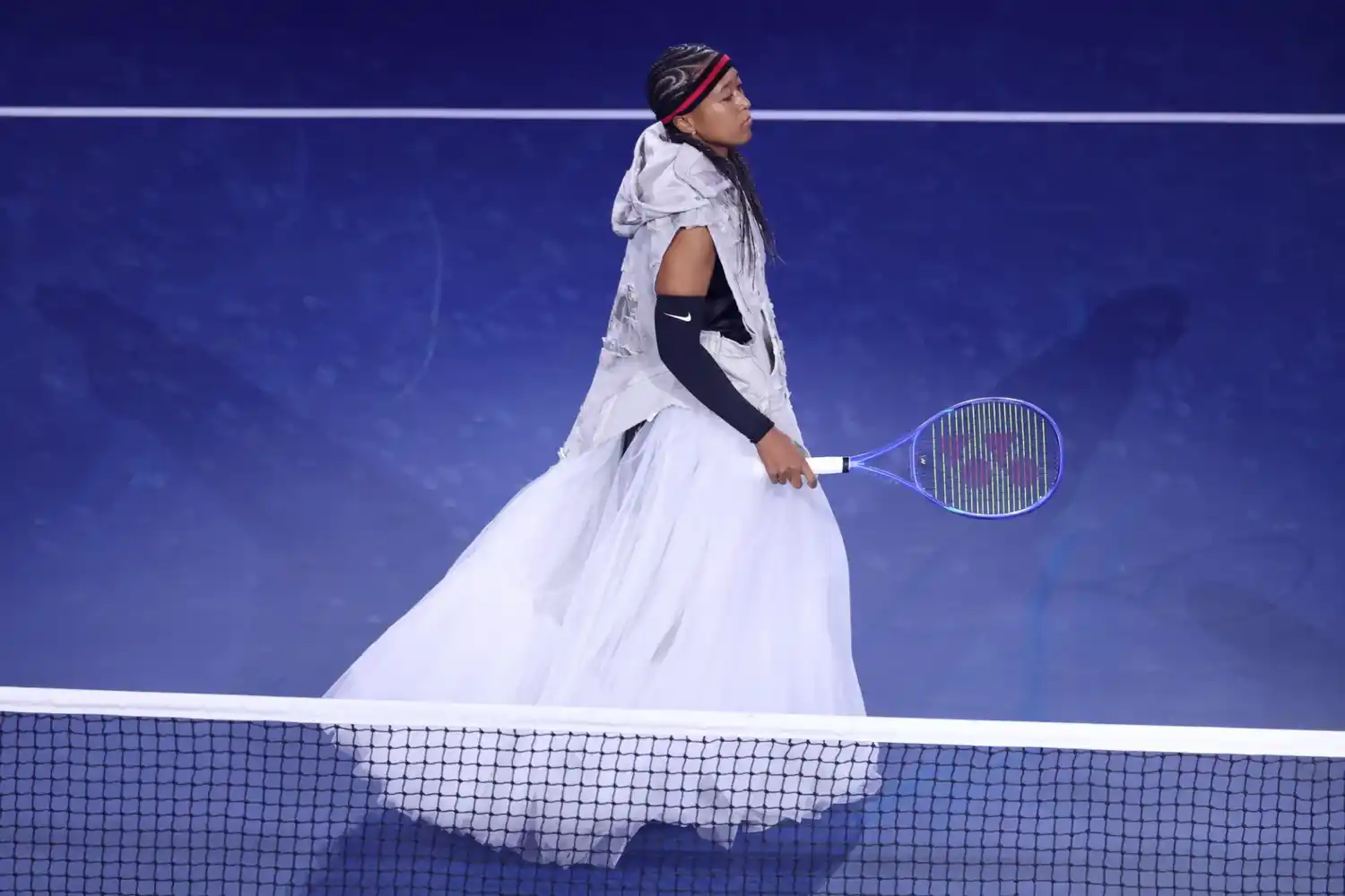 Naomi Osaka, durante su ingreso a la cancha para disputar su primer partido en el US Open.
