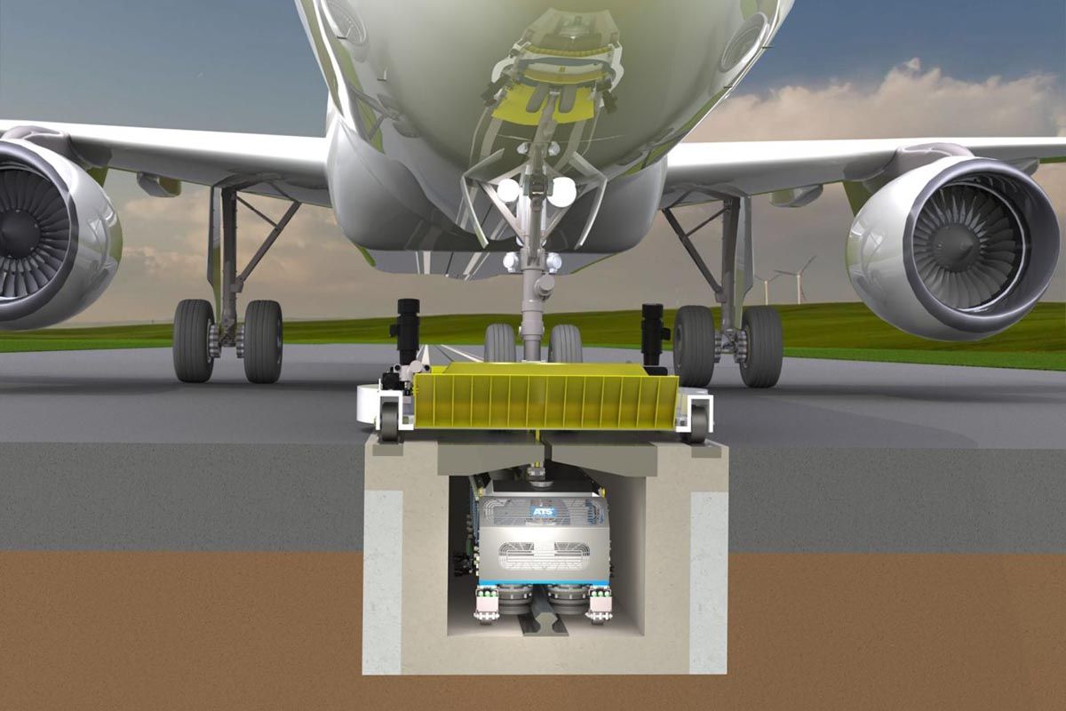 Empresa propone sistema de remolque de aviones que utiliza rieles subterráneos