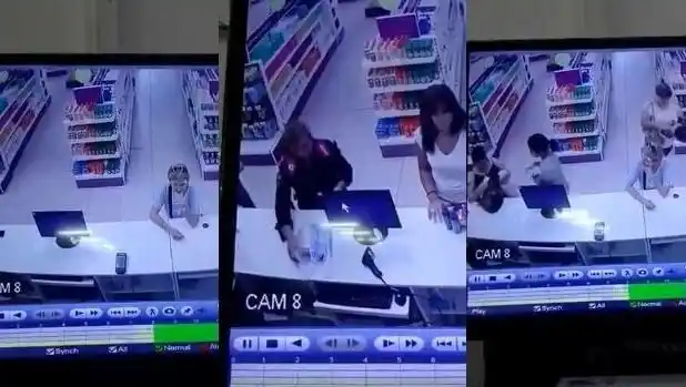 Una mujer policía le robó el celular a una clienta en una farmacia