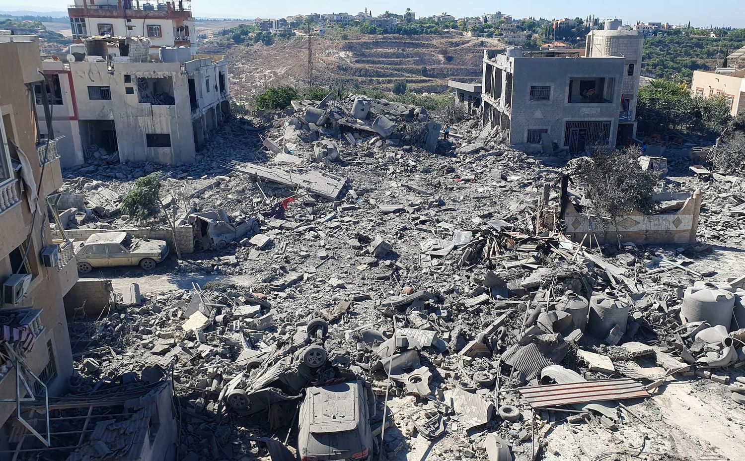 The rubble of destroyed buildings lies at the site of Israeli strikes in Saksakiyeh, southern Lebanon