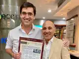El diputado Rogelio Iparraguirre y el director de El Eco, Rogelio Rotonda.