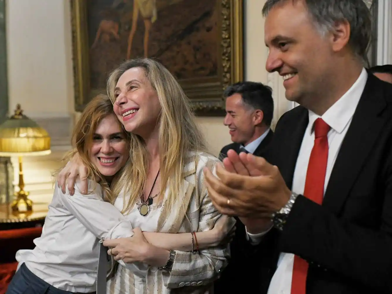 Tras la aprobación de la reforma laboral en Diputados, Lilia Lemoine junto a Karina Milei y Manuel Adorni.