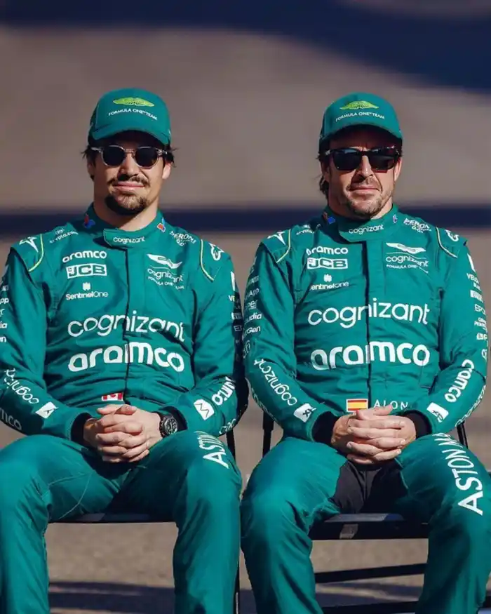 Plática entre Lance Stroll y Fernando Alonso