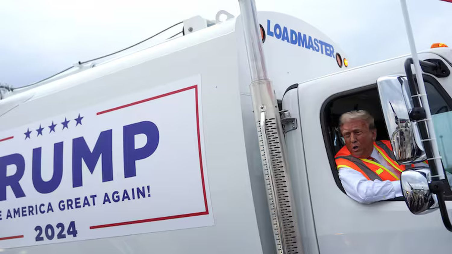 Donald Trump boards a garbage truck to draw attention to Biden remark