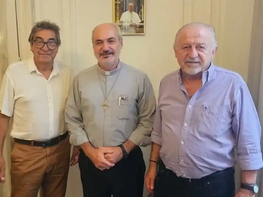 “Cachorro” Godoy, monseñor Dante Braida y Hugo Yasky, durante el encuentro de ayer.