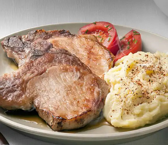 Hoy El Día está para chuletas con puré de papas