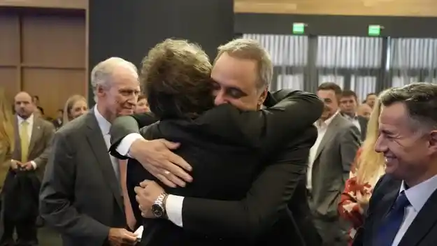 Milei y Adorni