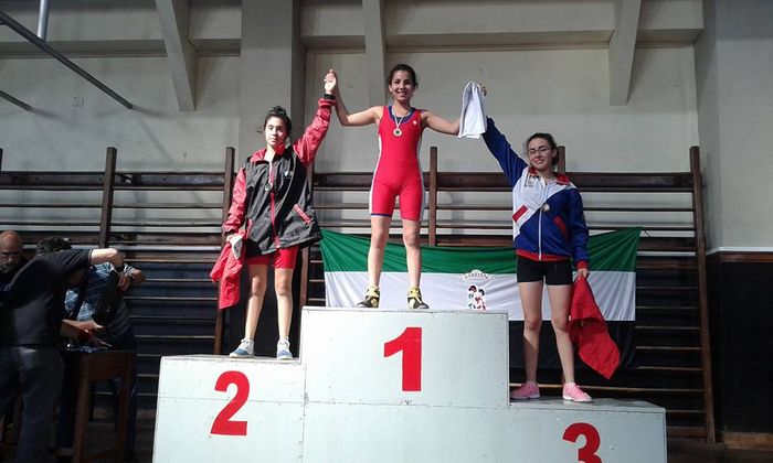 Milagros Ortiz en el podio. 
