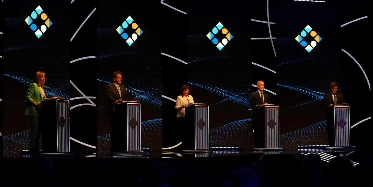 Los cinco candidatos sobre el escenario este domingo en Santiago del Estero. Crédito: Emilio Rapetti / Télam