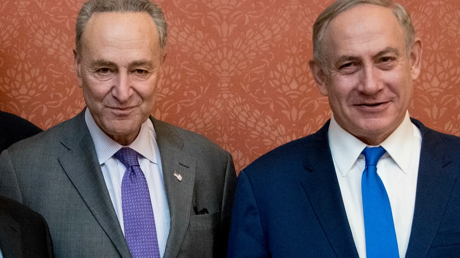 Israeli Prime Minister Benjamin Netanyahu, right, poses for a picture with Senate Minority Leader Chuck Schumer of New York, on Capitol Hill in Washington, Feb. 15, 2017