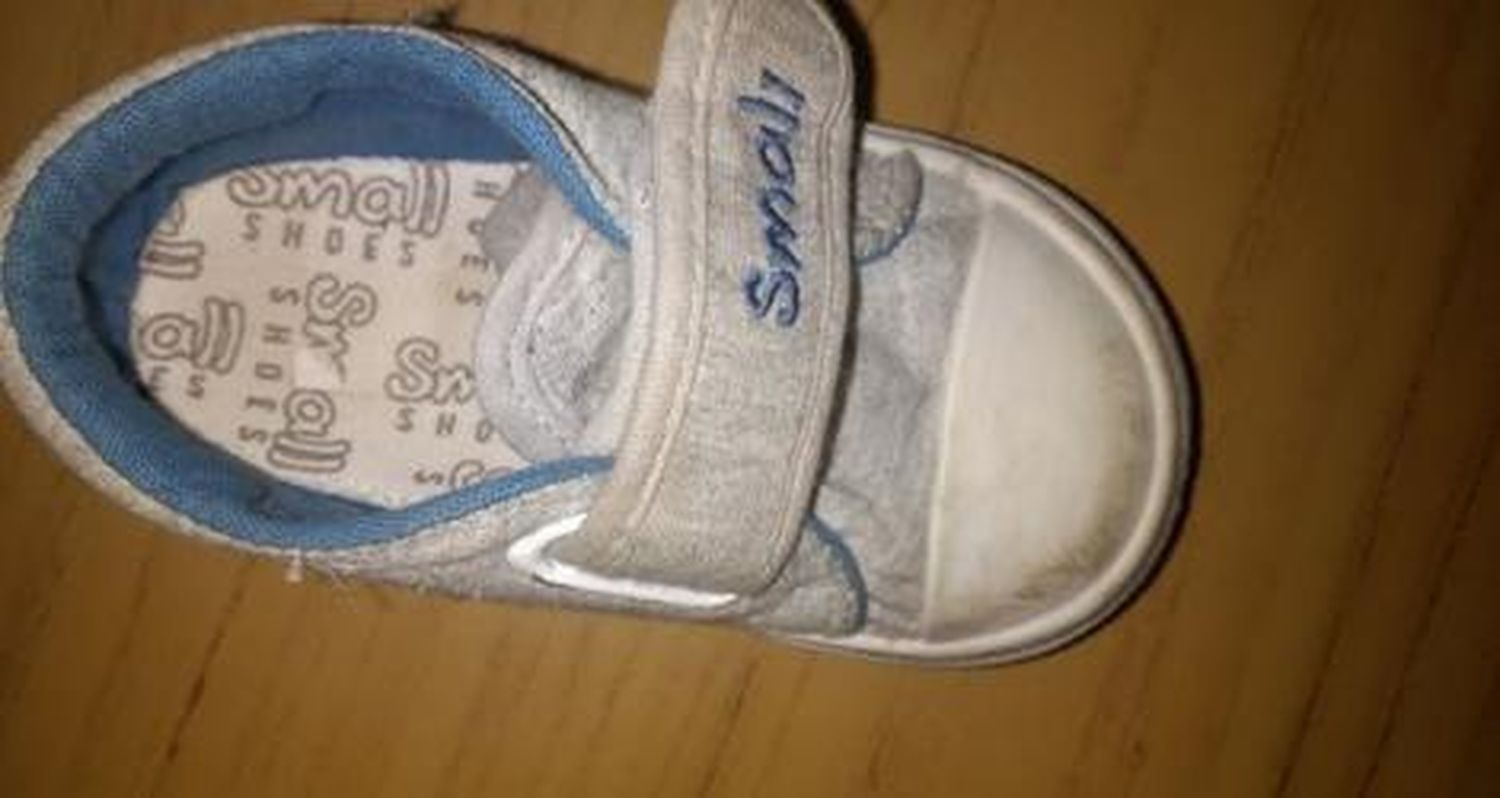 Zapatilla de bebé perdida