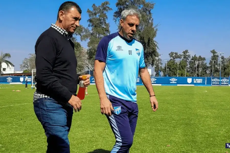 Mario Leito junto a Pusineri, actual DT del 