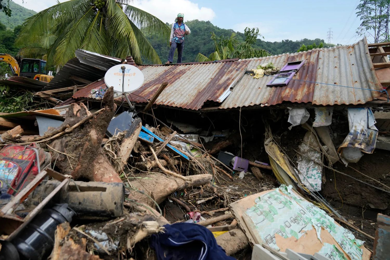 At least 126 dead and missing in massive flooding and landslides